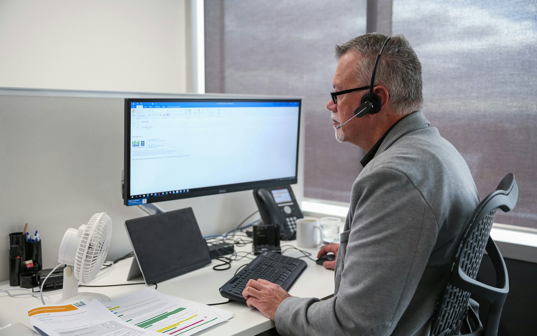 Man in suit on computer