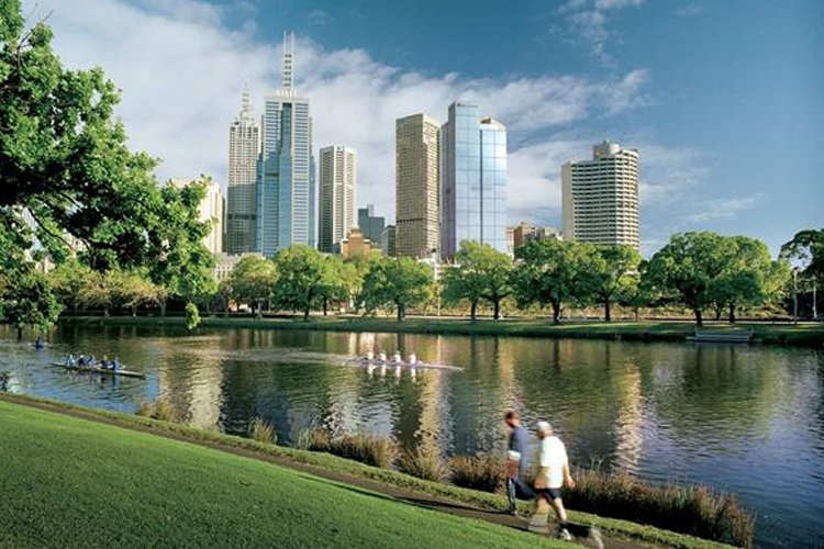 Waterfront river couple walking