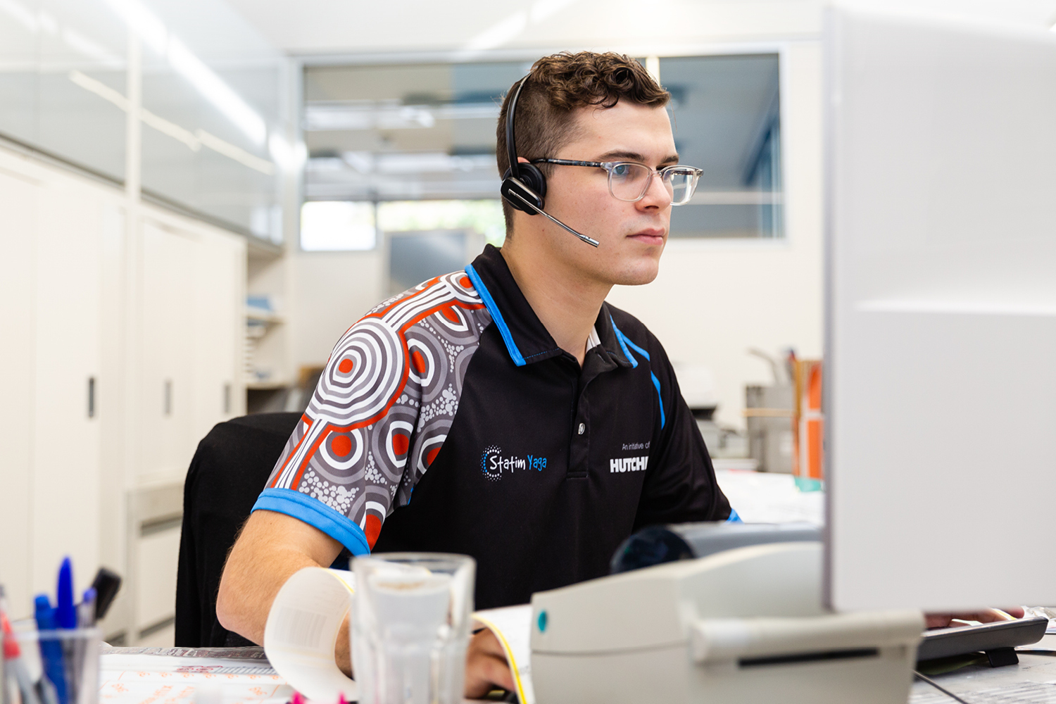 Cbus broadcast man at computer