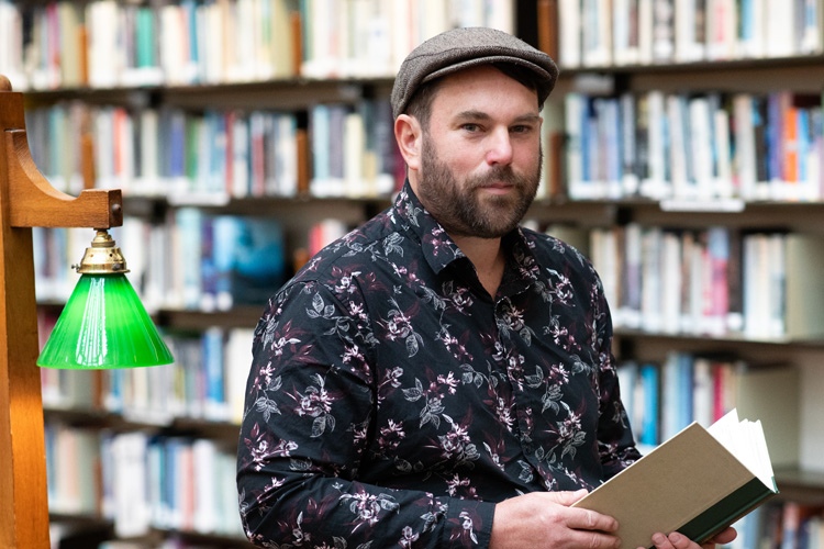 Man with a book 750x500