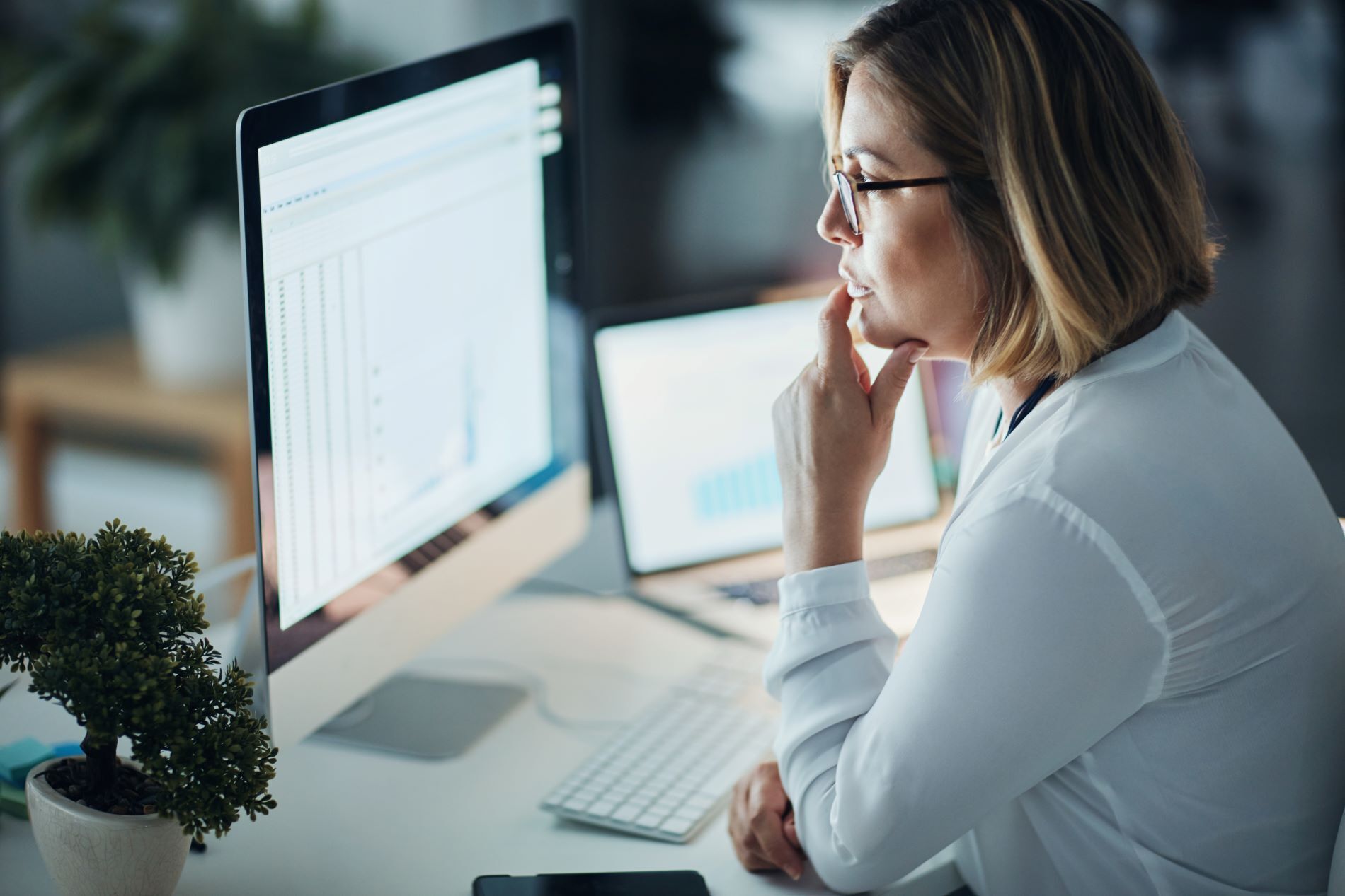 Woman in front of monitor
